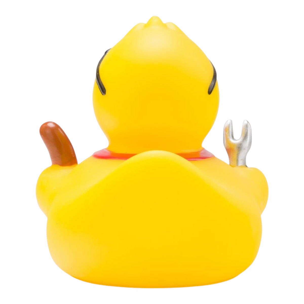 Back view of Connemara Country Ben BBQ rubber duck holding a sausage and grilling fork, wearing a red apron.