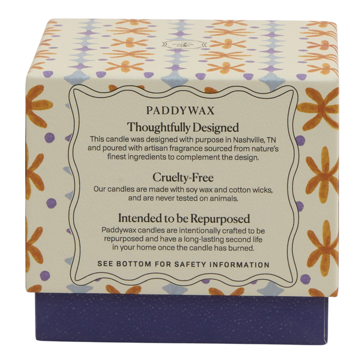 Connemara Country Paddywax tulip candle box with orange and blue floral pattern and product information details