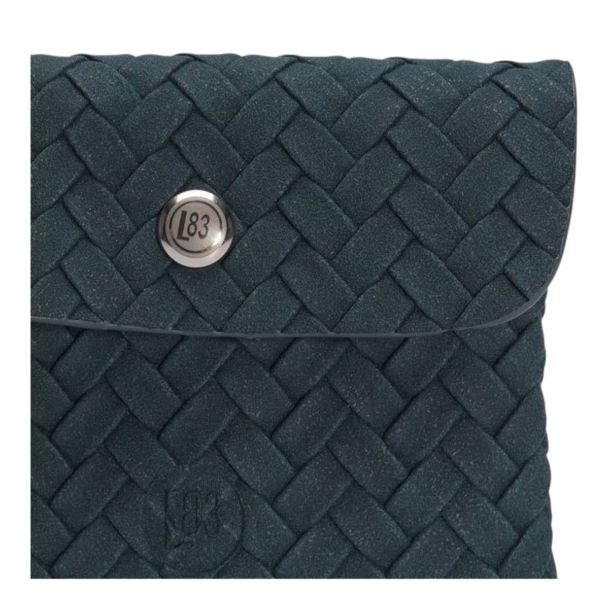 Connemara Country LOT83 Fenna 35 wallet in dark blue with a woven texture and silver logo snap button closure.