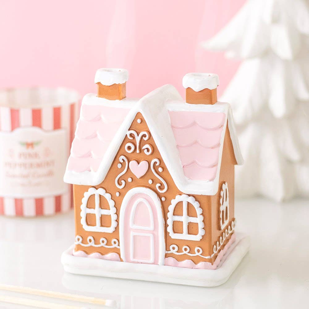 Connemara Country pink gingerbread house incense cone burner with white icing details for festive Christmas decor