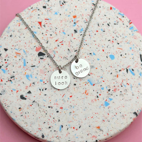 Rudies and Co  'Sure Look Be Grand'  Engraved Disc Necklace