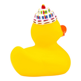 Connemara Country Gabi birthday rubber duck wearing a colorful cake hat with a candle, back view