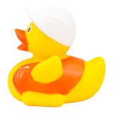 Connemara Country rubber duck dressed as a construction manager with a white hard hat, orange safety vest, and plans.