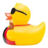 Connemara Country Ben BBQ rubber duck wearing sunglasses and a grill apron, holding a sausage, side view.