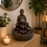 Connemara Country resin Buddha indoor fountain with cascading water, rotating glass ball, and color-changing LED lights