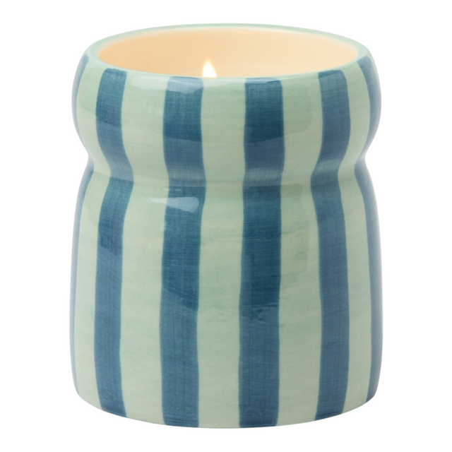Connemara Country Paddywax Cabana ceramic candle with blue and navy vertical stripes and a warm cider scent