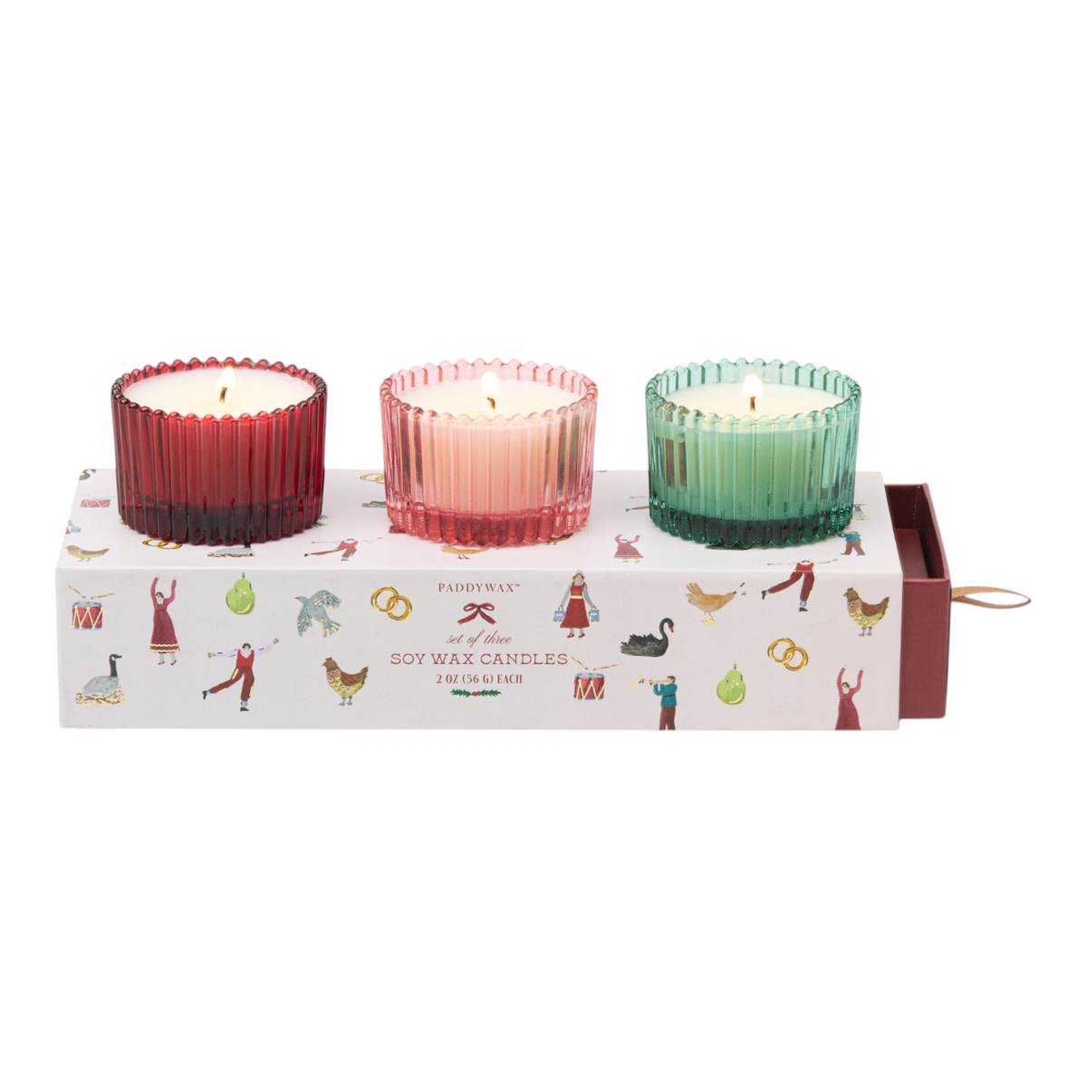 Connemara Country Paddywax Christmas gift set featuring three ribbed glass candles in red, pink, and green festive scents