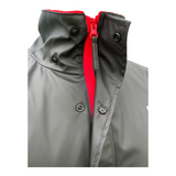 Connemara Country Breeze Up Monsoon black waterproof jacket with a red fleece lining and front zipper detail.