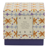 Connemara Country Paddywax Tulip candle box with orange and purple floral pattern and scent notes on the front label