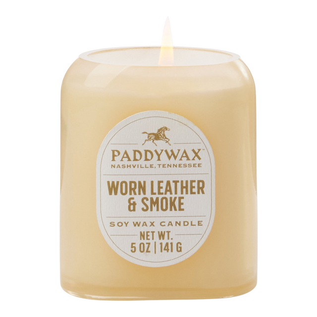 Connemara Country Paddywax Vista 5 oz soy wax candle in a tan glass vessel with Worn Leather & Smoke scent label