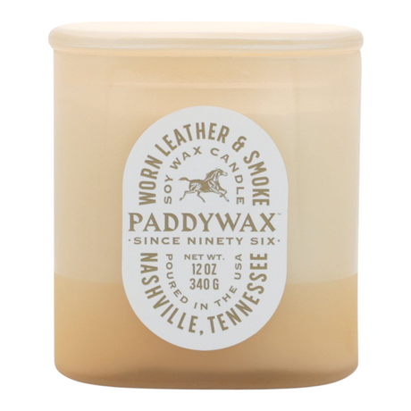 Connemara Country Paddywax Vista tan glass candle with Worn Leather and Smoke scent label