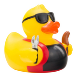 Connemara Country Ben BBQ rubber duck wearing sunglasses and a grill apron, holding a fork and a sausage.