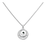 Connemara Country round silver pendant featuring a Trinity knot design and a central green stone on a silver chain.