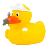 Connemara Country yellow rubber duck golfer wearing a white cap and holding a golf ball with a bag under its wing.