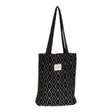 Connemara Country De La Mur small black jacquard tote bag with a geometric diamond pattern and shoulder straps