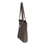 Connemara Country De La Mur small tote bag in brown jacquard fabric with a geometric diamond pattern, side view.