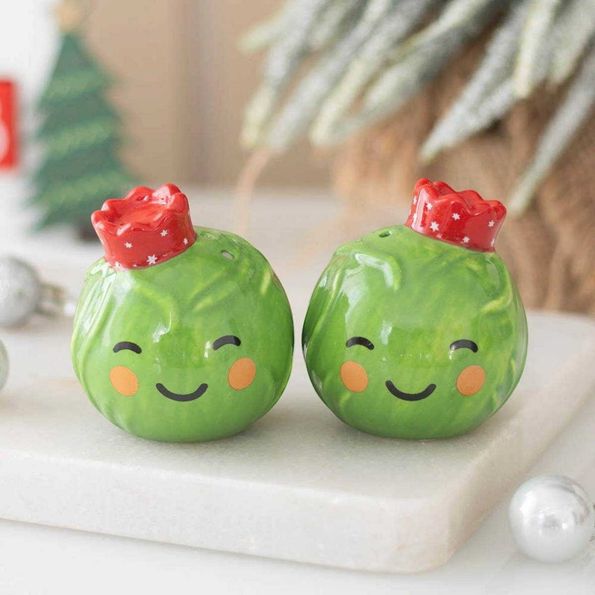 Connemara Country ceramic Brussels sprout salt and pepper shakers with festive red crowns and smiling faces