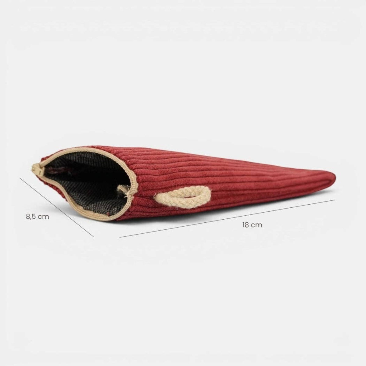 Connemara Country burgundy corduroy glasses case with a zipper closure and beige cord handle on a white background.