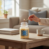 Connemara Country large glass jar candle with a yellow wax fill and a Citrus Rush scent label. Features a single wick and a clear glass lid.
