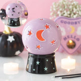 Connemara Country ceramic crystal ball tealight and incense holder in pastel purple with moon and star cut-outs.
