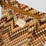 Connemara Country De La Mur small tote bag in brown and beige geometric jacquard fabric with a top zipper closure.