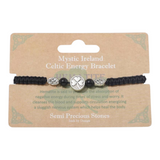 Connemara Country hematite bead bracelet with a silver shamrock charm on a branded display card