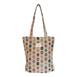 Connemara Country De La Mur small jacquard tote bag with pink and orange geometric print and top zipper closure