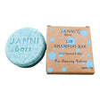 Connemara Country Janni Bars blue seaweed and mint shampoo bar with eco-friendly packaging on a pebble beach
