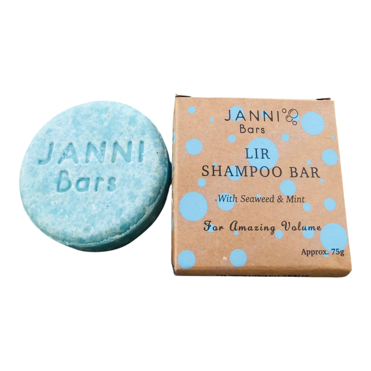 Connemara Country Janni Bars blue seaweed and mint shampoo bar with eco-friendly packaging on a pebble beach