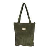Connemara Country De La Mur small moss green wide-wale corduroy tote bag with shoulder straps and top zipper closure.