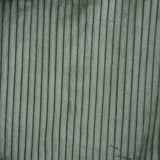 Close-up of Connemara Country moss green wide-wale corduroy fabric with vertical textured ridges