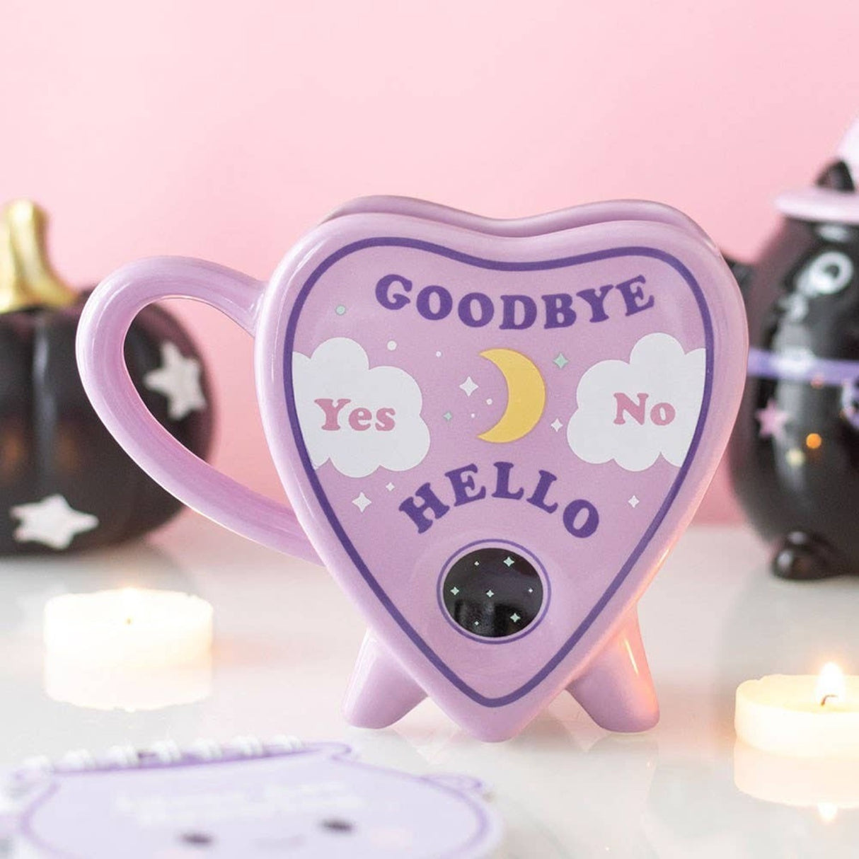 Connemara Country pastel purple ceramic planchette mug with celestial talking board design and heart-shaped handle.