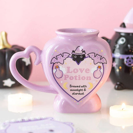 Connemara Country pastel purple heart-shaped love potion mug with bat and star graphics and Brewed with moonlight text.