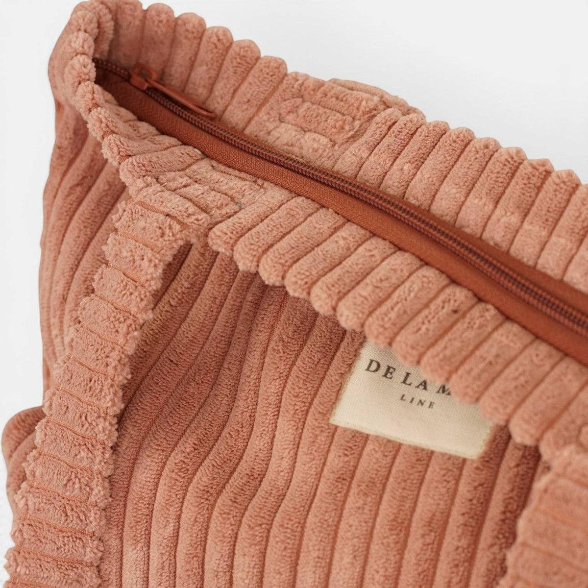 Connemara Country pink corduroy tote bag with a top zipper closure and De La Mur brand label detail