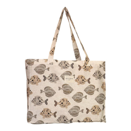 Connemara Country De La Mur rectangular fabric bag in beige with a brown fish print and shoulder straps.