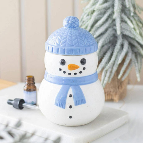Connemara Country ceramic snowman oil burner with a blue hat and scarf, perfect for festive winter home decor.
