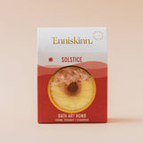 Connemara Country Enniskinn Solstice bath art bomb in orange and yellow packaging with citrus and cedarwood scent.
