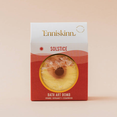 Connemara Country Enniskinn Solstice bath art bomb in orange and yellow packaging with citrus and cedarwood scent.