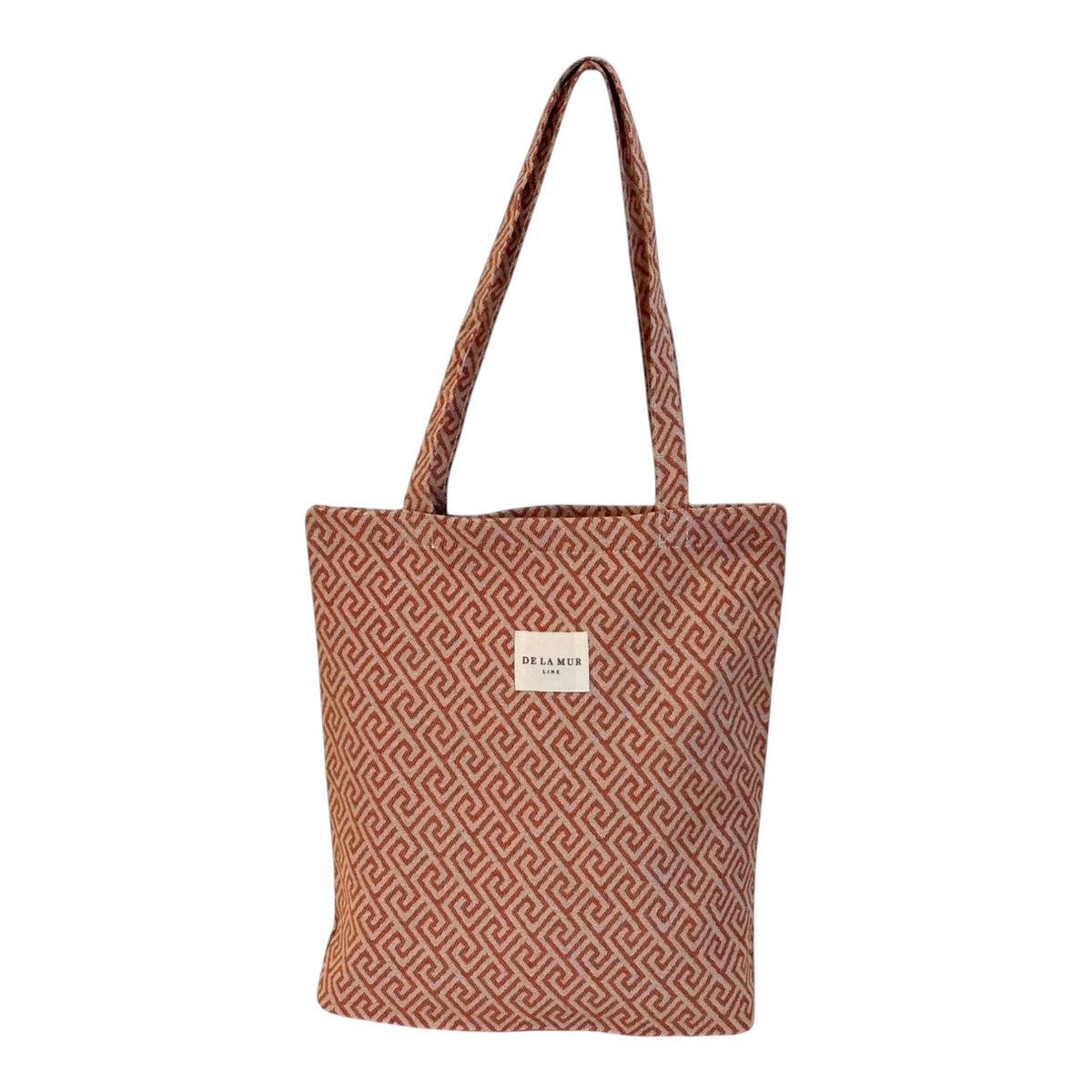 Connemara Country De La Mur small tote bag in terracotta jacquard fabric with a geometric Greek key pattern.