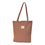 Connemara Country De La Mur small tote bag in terracotta jacquard fabric with a geometric Greek key pattern.
