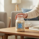 Connemara Country's Price's Candles Vanilla Drift scented candle in a clear glass jar with a lid. Creamy vanilla wax with a single wick.