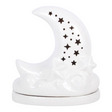 Connemara Country white ceramic moon incense cone holder with star cut-outs and sculpted cloud details.