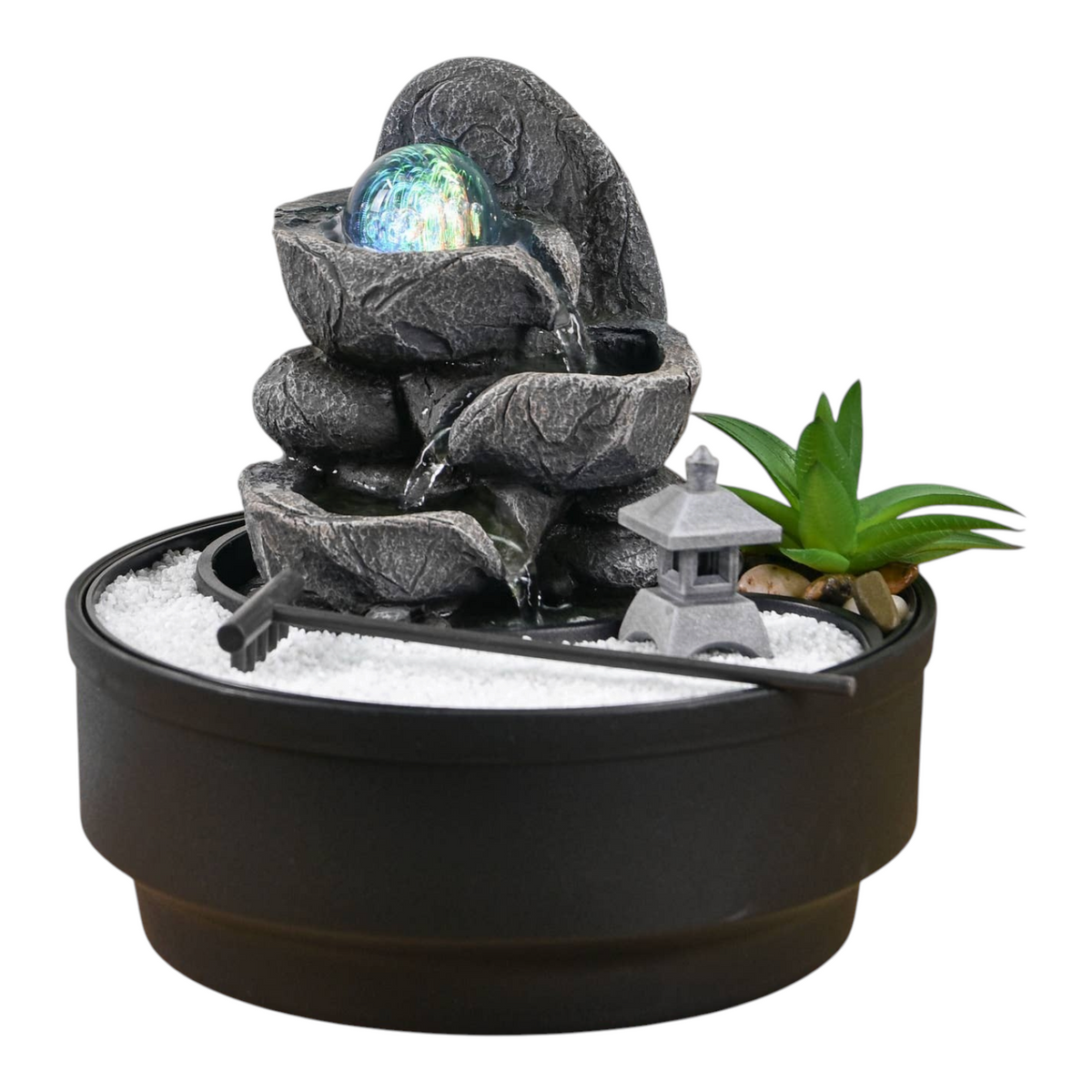 Connemara Country Bogota Zen garden indoor fountain with LED glass ball, sand, rake, and temple on a wooden table.
