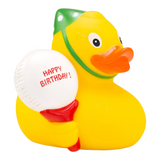 Connemara Country yellow rubber duck wearing a green party hat and holding a white Happy Birthday balloon